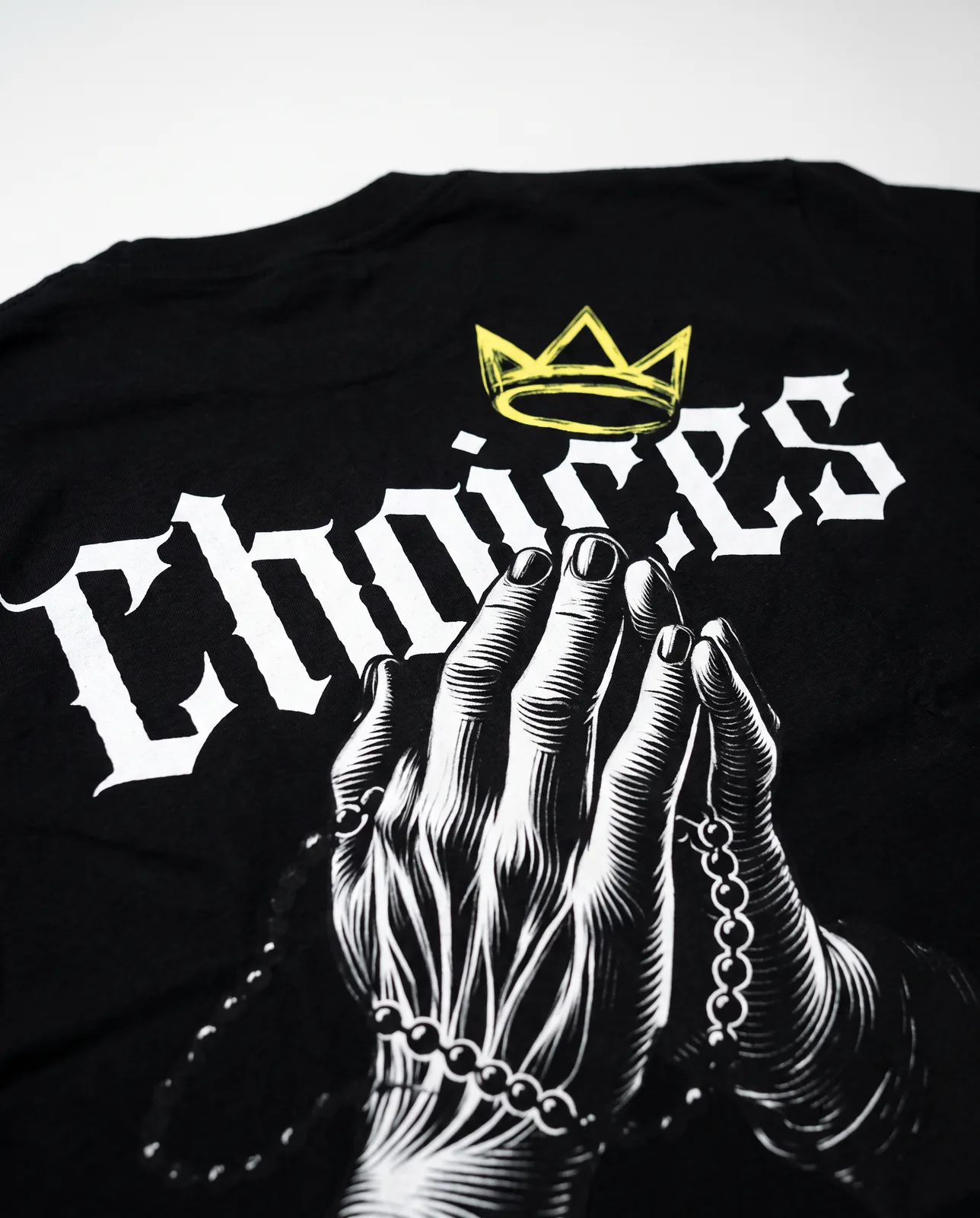 Crowned Choices back print in close detail